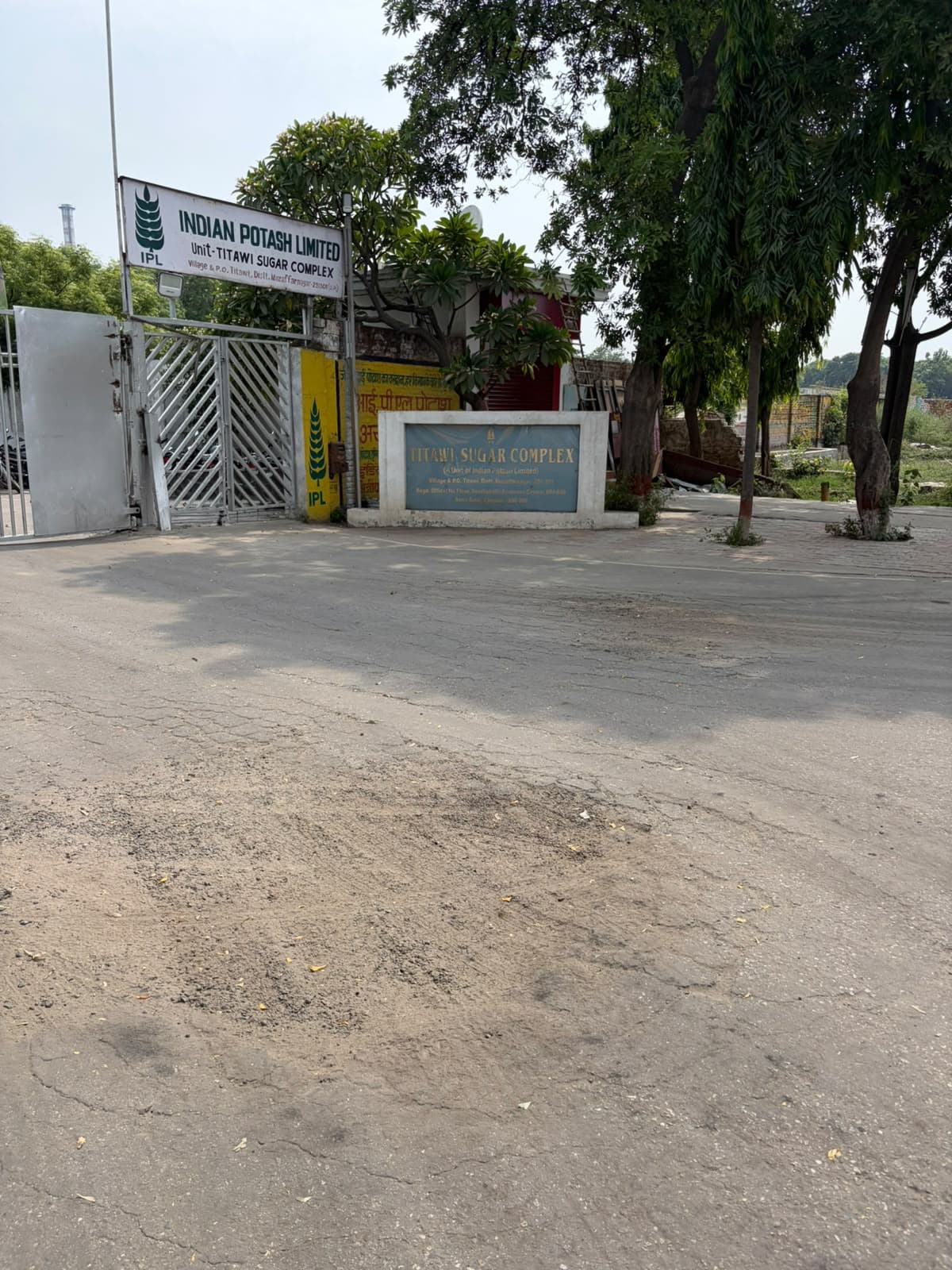 Entrance signage at Titawi Sugar Complex, Muzaffarnagar UP — site presence